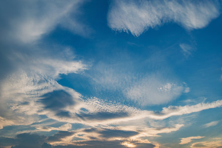 Amazing cloudscape on the sky at sunset time after rain.の写真素材