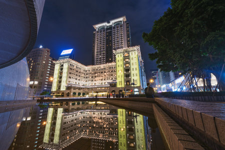 Hong Kong - December 13, 2016: Evening view of Peninsula hotel in Kowloon.のeditorial素材