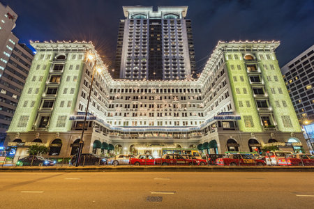Hong Kong - December 13, 2016: Evening view of Peninsula hotel in Kowloon.のeditorial素材