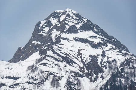 Mountain under the snow at evening time. Caucasus.