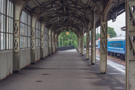 Train stands by the platform before departure.の写真素材