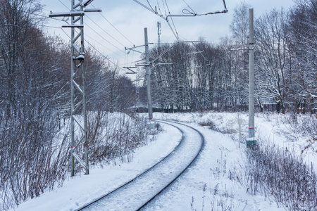 Railway line through the winter landscape.の写真素材