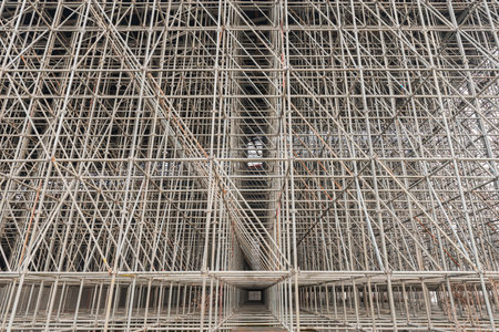 Vertical scaffolding formed a myriad of grid.の写真素材