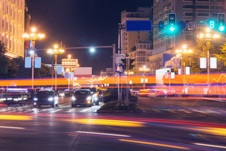 Car lights on the central city streets.の写真素材