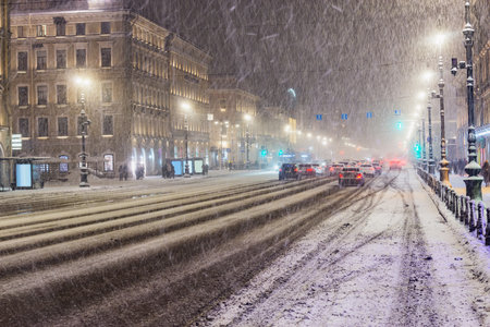 City street of the historical center at snowfall time. Saint Petersburg. Russia.の写真素材