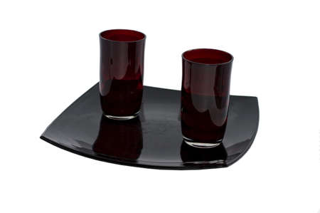 two glasses on a black plateの写真素材