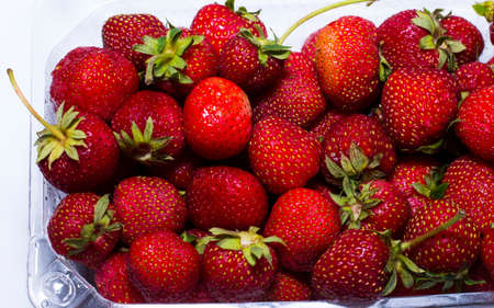 natural strawberry in the plastic containerの写真素材