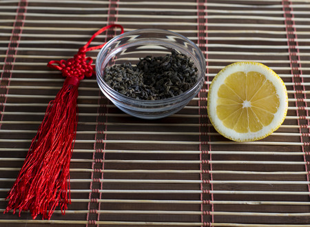 tea for preparation of drink and the cut lemonの写真素材