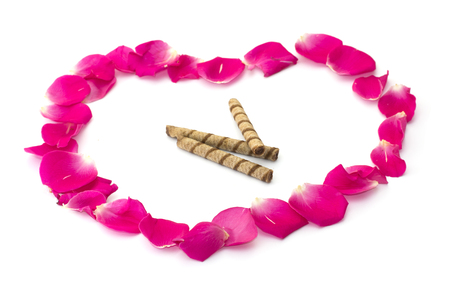 beautiful figure from petals of roses and cookiesの写真素材