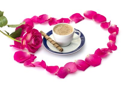 cup of coffee petals of roses and scarlet roseの写真素材