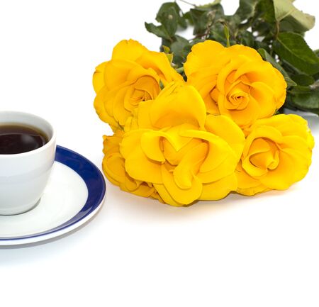 cup of coffee and yellow flowers, isolateの写真素材