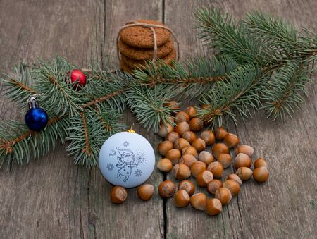 baking, nutlets, Christmas tree decorations and coniferous branch, still life, subject Christmas and New Yearの写真素材