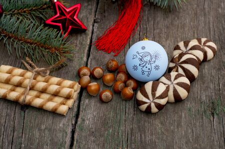 the forest nutlets and baking decorated with a coniferous branch a still life, the subject Christmas and New Yearの写真素材