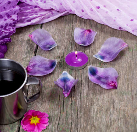 still life, candle, petals and lilac scarf, subject food and drinksの写真素材