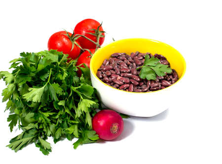 parsley, tomatoes, garden radish and plate with crude haricot, a subject products, vegetablesの写真素材