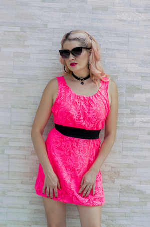 beautiful model in the shooting wall, the theme of beautiful bright women in the summerの写真素材