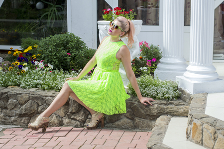 beautiful woman in flower decorations, the theme of beautiful vibrant womenの写真素材