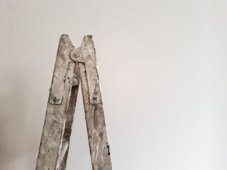 Different angles of a painter's ladder in a room to be refurbishedの写真素材