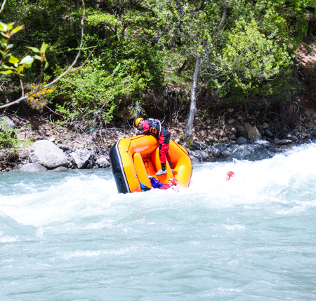 Rafting in a river of Huesca, Spain. Group of tourists in the inflatable raftのeditorial素材