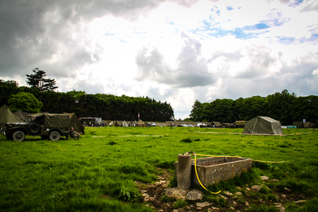 Normandy, France; 4 June 2014: View of recreation camp in Normandy for the 70th anniversary with vehicles and tentsのeditorial素材
