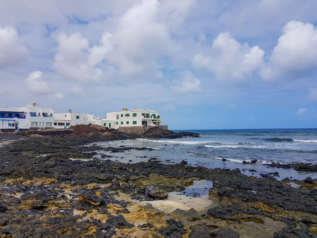 Image of buildings on the coast and the sea in Arrieta. Lanzarote, Spainの写真素材