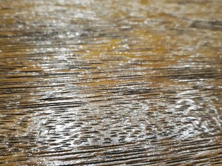 Wooden flooring with beautiful natural design and light reflection as backgroundの写真素材