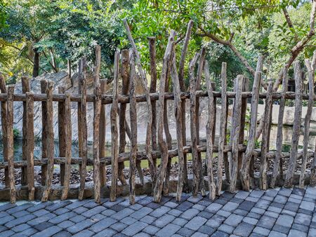 Fencing with dry wood logsの写真素材