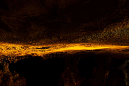 Interior of a beautiful karst cave with stalactites and stalagmites