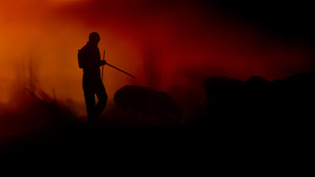 Silhouette of a man with an ax in his hand. Silhouette of a man with a ax in the smoke. Selective...