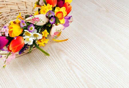 artifical flowers on a wooden backgroundの写真素材