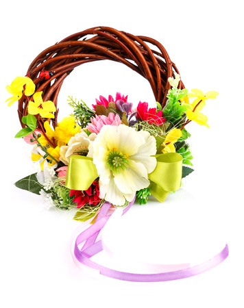 wreath of twigs and flower composition isolated on whiteの写真素材