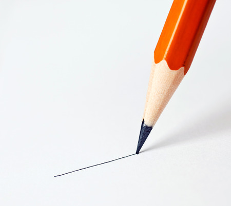 pencil draws a straight line on a white backgroundの写真素材