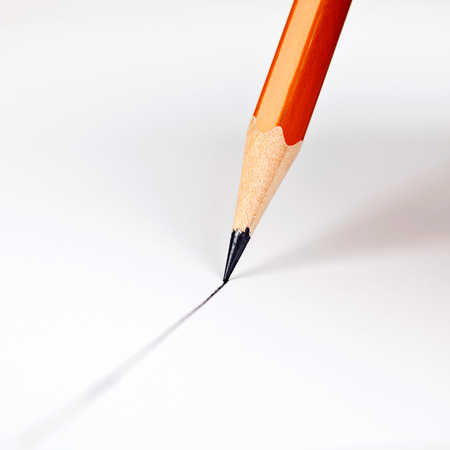 pencil draws a straight line on a paperの写真素材