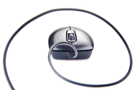 Optical computer wheel mouse on a white backgroundの写真素材