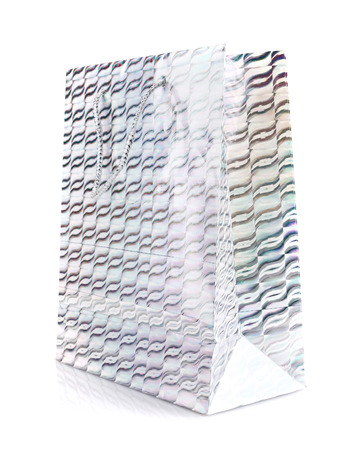 Silver gift bag isolated on a white backgroundの写真素材
