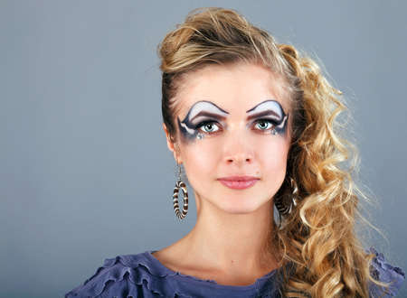 women with hairstyle and makeup in a dressの写真素材