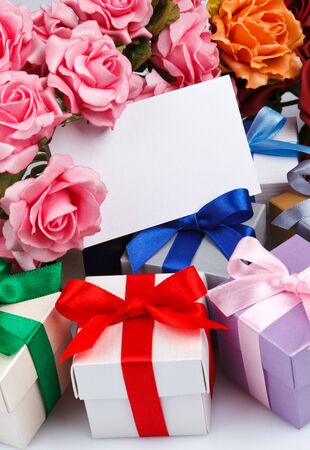 Greeting card with flowers and gift boxesの写真素材