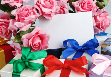 Greeting card with flowers and gift boxesの写真素材