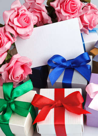 Greeting card with flowers and gift boxesの写真素材