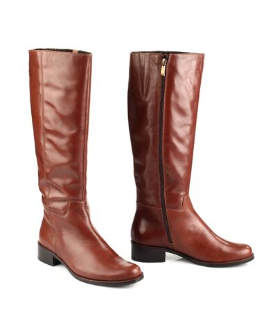 brown female boots isolated on white backgroundの写真素材