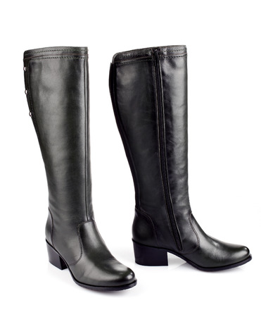 Black leather female boots isolated on white backgroundの写真素材