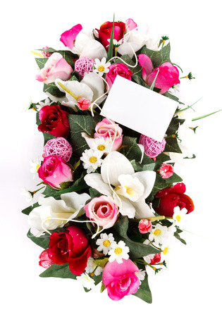 decorated flowers basket vith with blank card isolatedの写真素材