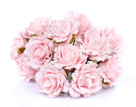 artificial bouquet of pink roses on a white backgroundの写真素材