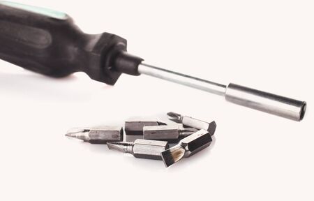 screwdrive and replaceable bits on whiteの写真素材