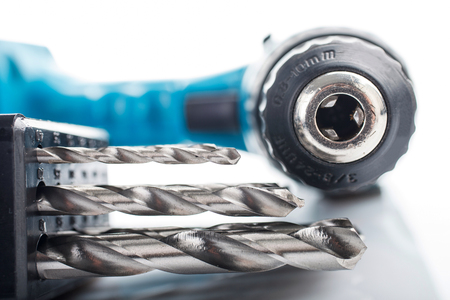 Hard metal tool bits collection with drill in whiteの写真素材