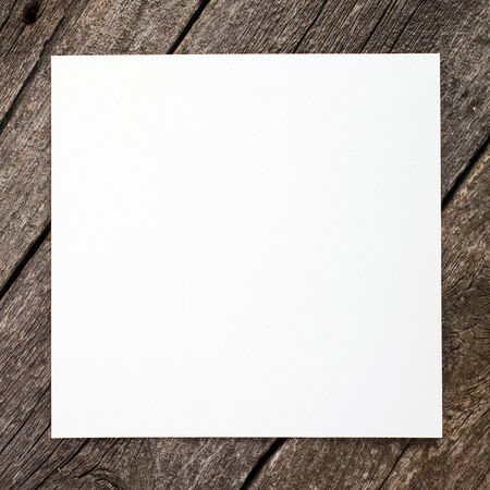grunge wooden background with blank paperの写真素材