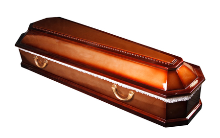 an ornate mahogany coffin casket with brass handlesの写真素材