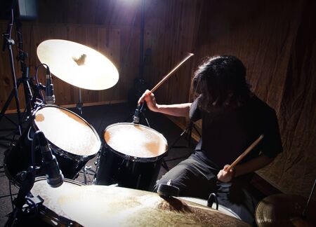 drummer playing his drums setの写真素材