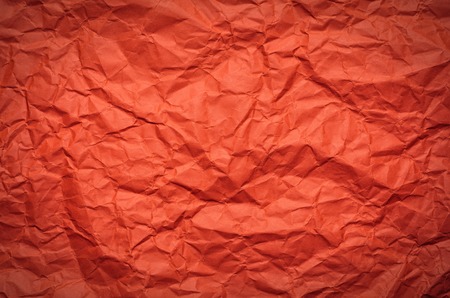 orange Crumpled paper backgroundの写真素材