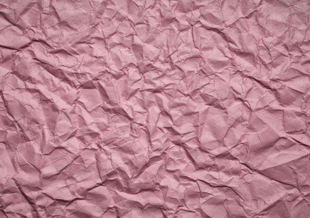 pink Crumpled paper background, space for textの写真素材